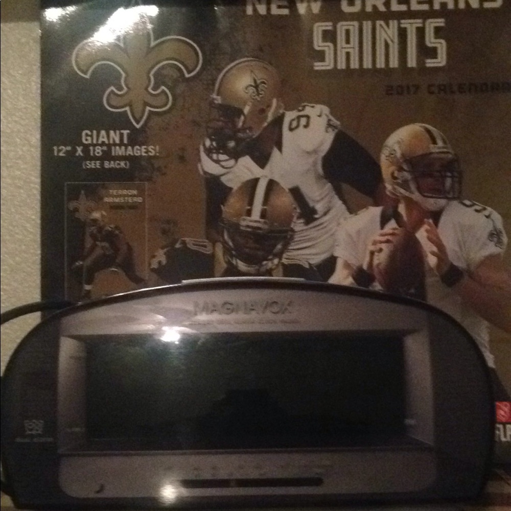 alarm clock comes with saints calendar
